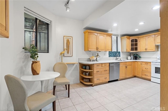 1277 S Beverly Glen Blvd Unit 205, Los Angeles, CA 90024 - kitchen with stainless steel dishwasher, electric range, light countertops, glass insert cabinets, and light tile patterned floors