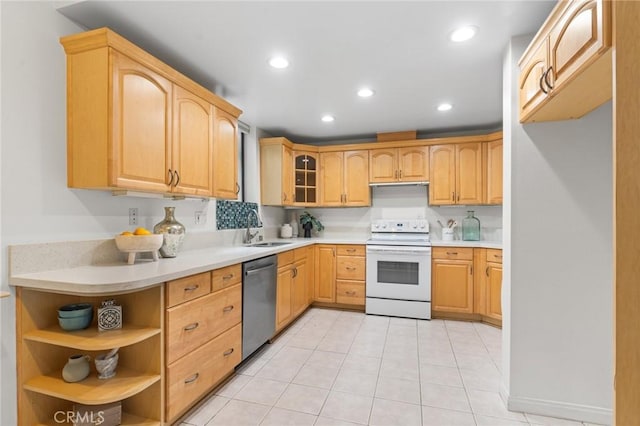 1277 S Beverly Glen Blvd Unit 205, Los Angeles, CA 90024 - kitchen with stainless steel dishwasher, white range with electric cooktop, light countertops, light tile patterned floors, and recessed lighting
