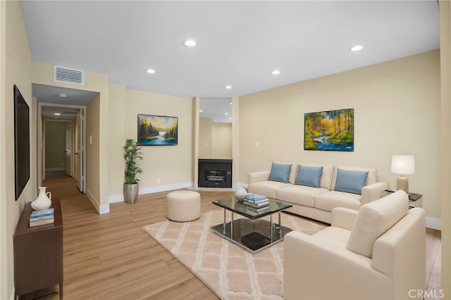 1207 N Columbus Ave, Glendale, CA 91202 - living area featuring light wood-type flooring and recessed lighting