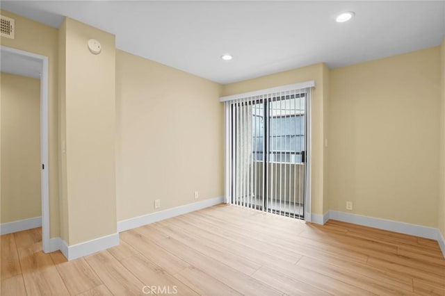 1207 N Columbus Ave, Glendale, CA 91202 - spare room with wood finished floors, recessed lighting, and a smoke detector