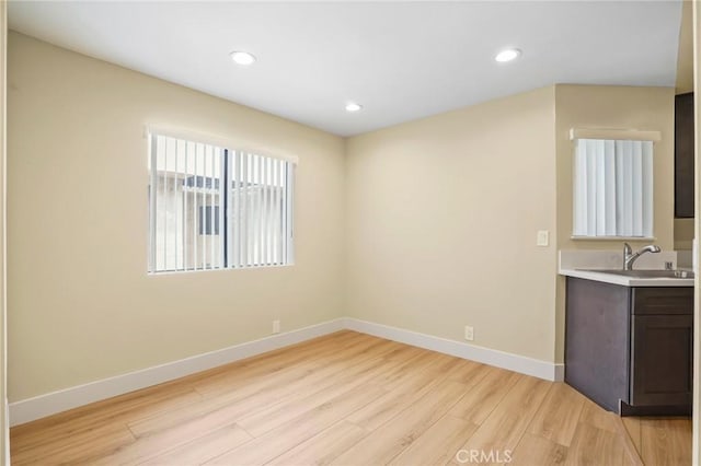 1207 N Columbus Ave, Glendale, CA 91202 - unfurnished dining area with light wood finished floors and recessed lighting