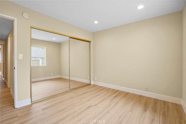 1207 N Columbus Ave, Glendale, CA 91202 - unfurnished bedroom featuring light wood-style floors, a closet, and recessed lighting