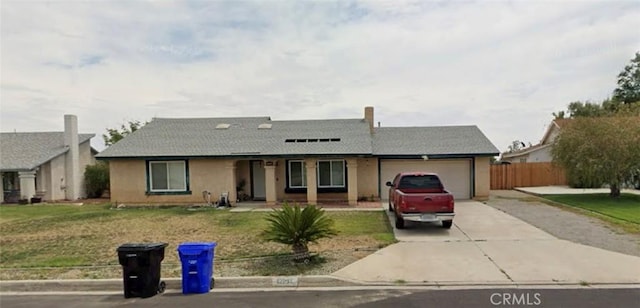 12831 Stage Coach Dr, Victorville, CA 92392 - single story home featuring concrete driveway, a garage, covered porch, and stucco siding