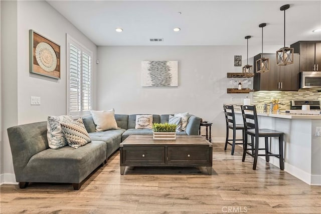 6 Fenix St, Rancho Mission Viejo, CA 92694 - living room with light wood-type flooring and recessed lighting
