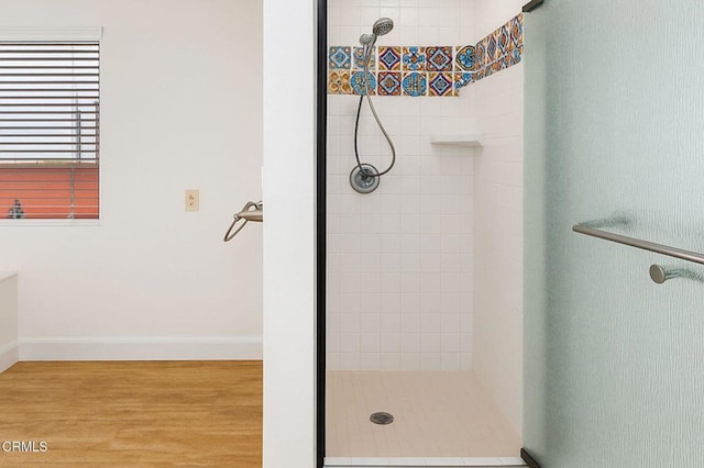 381 Highland Dr, Oxnard, CA 93035 - bathroom with a stall shower and wood finished floors