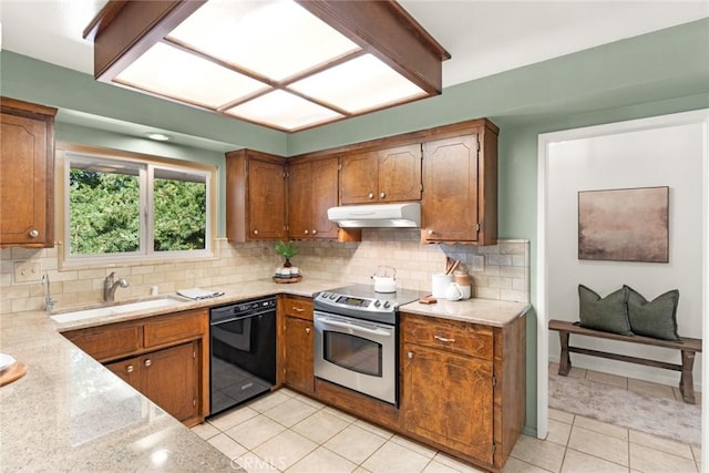 667 Morgan Dr, Chico, CA 95973 - kitchen with black dishwasher, electric range, under cabinet range hood, light countertops, and tasteful backsplash