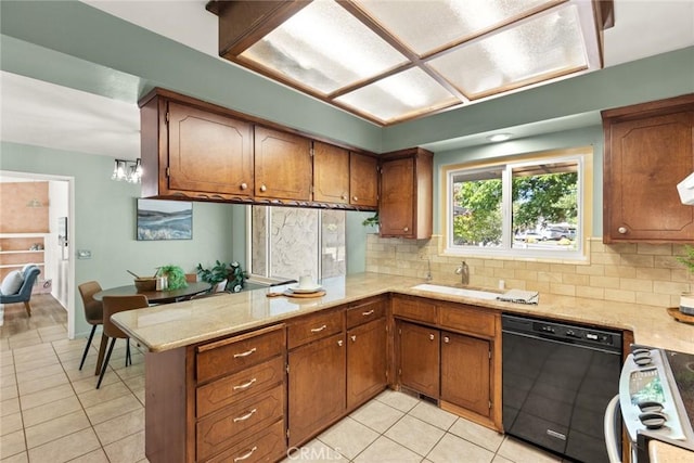 667 Morgan Dr, Chico, CA 95973 - kitchen featuring dishwasher, stove, light tile patterned flooring, and brown cabinets