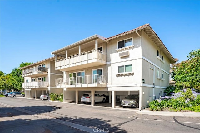 2143 Ronda Granada Unit P, Laguna Woods, CA 92637 - view of property with covered parking