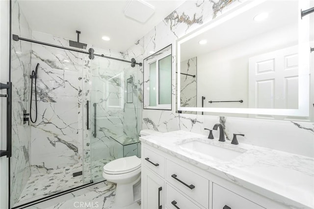 2143 Ronda Granada Unit P, Laguna Woods, CA 92637 - bathroom with marble finish floors, vanity, a marble finish shower, and recessed lighting