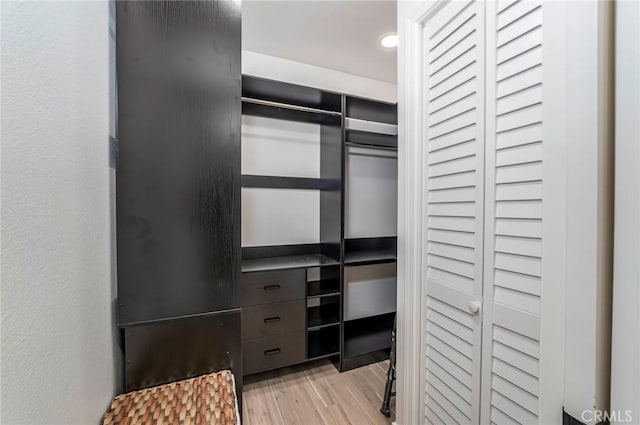 2143 Ronda Granada Unit P, Laguna Woods, CA 92637 - walk in closet with wood finished floors