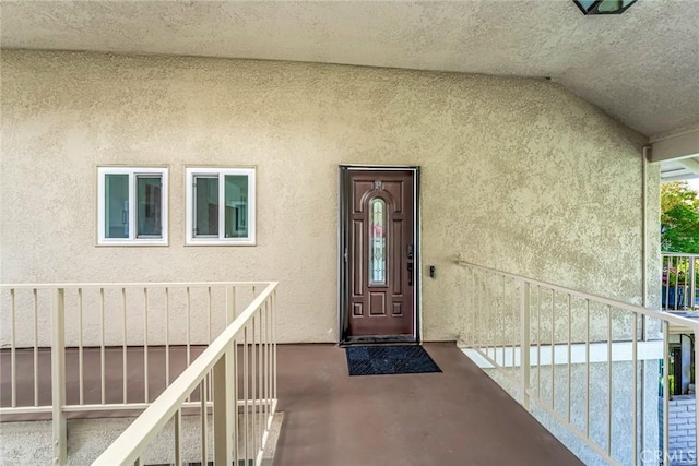 2143 Ronda Granada Unit P, Laguna Woods, CA 92637 - doorway to property featuring stucco siding