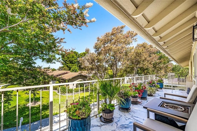 2143 Ronda Granada Unit P, Laguna Woods, CA 92637 - balcony featuring an outdoor fire pit
