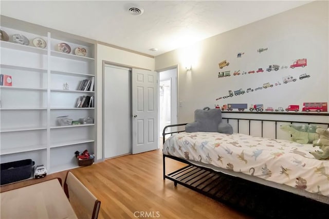 15041 Columbia Ln, Huntington Beach, CA 92647 - bedroom featuring wood finished floors and a closet