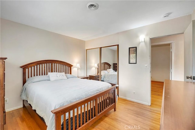 15041 Columbia Ln, Huntington Beach, CA 92647 - bedroom featuring light wood-style floors and a closet