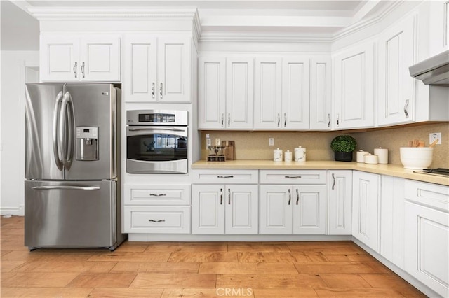 2767 Saleroso Dr, Rowland Heights, CA 91748 - kitchen with stainless steel appliances, light countertops, white cabinetry, and ornamental molding