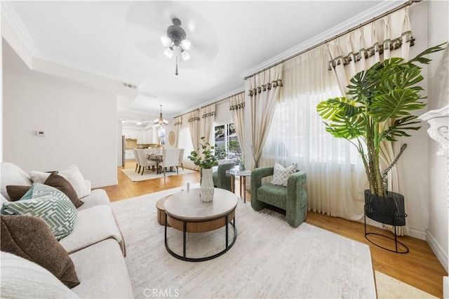 2767 Saleroso Dr, Rowland Heights, CA 91748 - living room with a ceiling fan, light wood-style flooring, and ornamental molding
