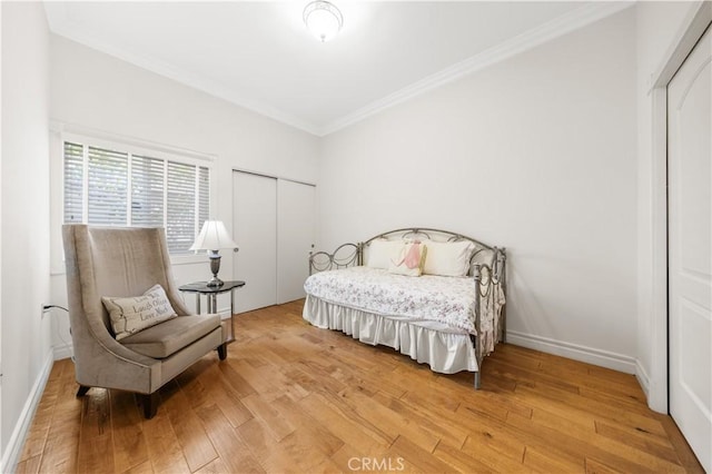2767 Saleroso Dr, Rowland Heights, CA 91748 - bedroom with crown molding, light wood finished floors, and a closet