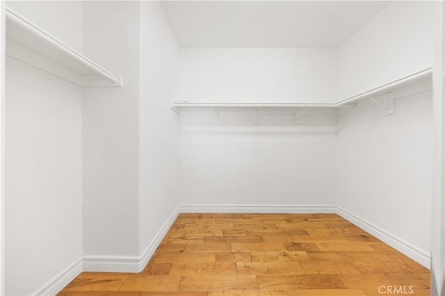 2767 Saleroso Dr, Rowland Heights, CA 91748 - walk in closet with light wood-style floors