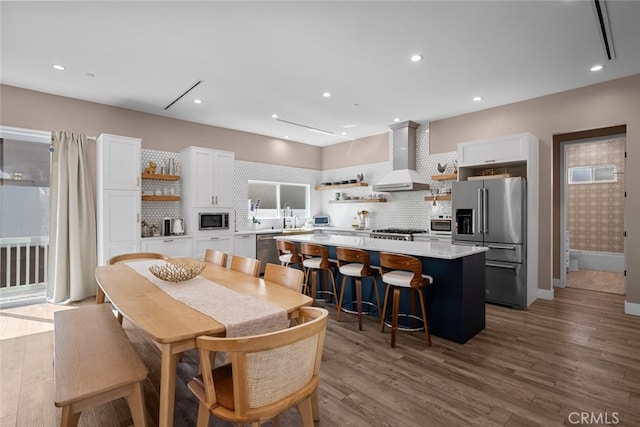 2920 Fairmount Ave, La Crescenta, CA 91214 - dining space featuring wood finished floors and recessed lighting