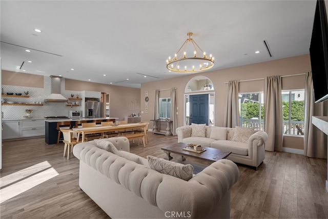 2920 Fairmount Ave, La Crescenta, CA 91214 - living area featuring a chandelier, recessed lighting, and light wood-type flooring