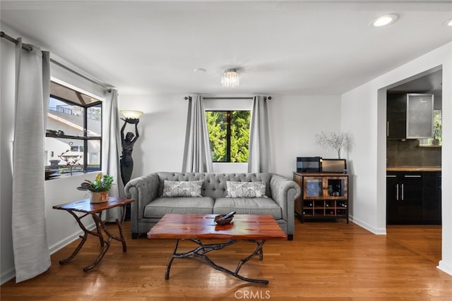 2920 Fairmount Ave, La Crescenta, CA 91214 - living area with plenty of natural light, wood finished floors, and recessed lighting