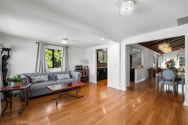 2920 Fairmount Ave, La Crescenta, CA 91214 - living room with a chandelier, light wood-style flooring, and recessed lighting