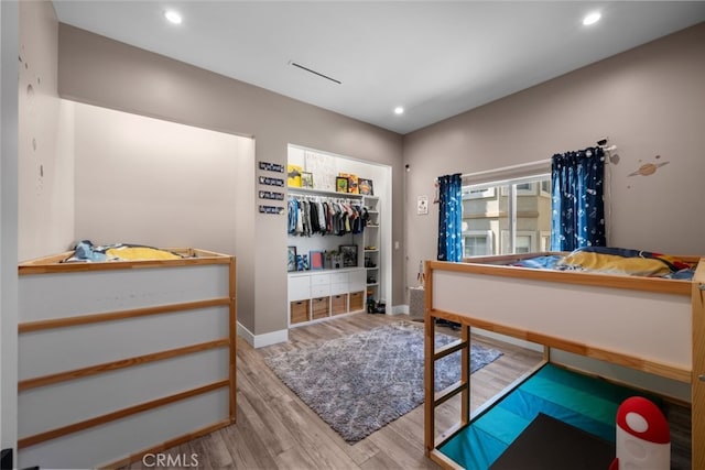 2920 Fairmount Ave, La Crescenta, CA 91214 - bedroom featuring wood finished floors, recessed lighting, and a closet