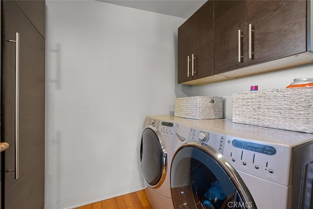2920 Fairmount Ave, La Crescenta, CA 91214 - washroom with cabinet space, separate washer and dryer, and light wood-type flooring