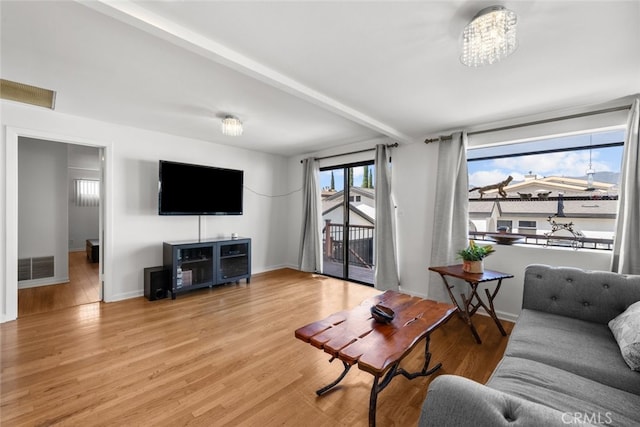 2920 Fairmount Ave, La Crescenta, CA 91214 - living room with light wood-style flooring and beam ceiling