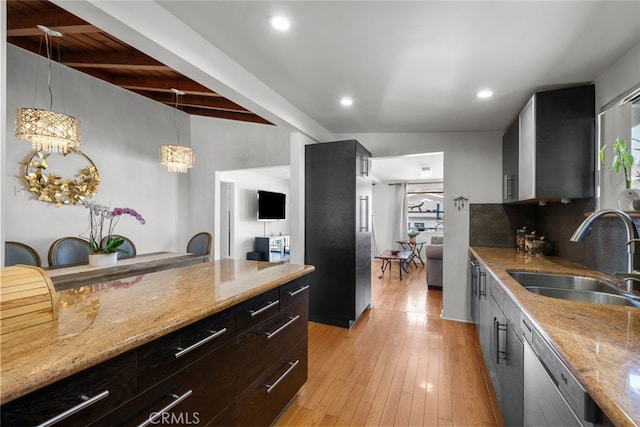 2920 Fairmount Ave, La Crescenta, CA 91214 - kitchen with dishwasher, beam ceiling, light wood-style floors, light stone counters, and hanging light fixtures