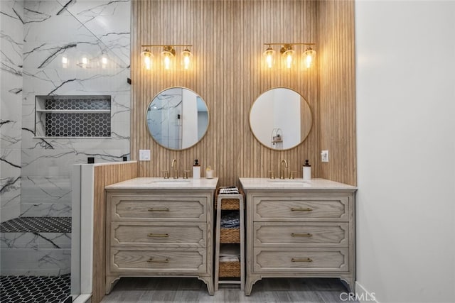 2920 Fairmount Ave, La Crescenta, CA 91214 - full bathroom featuring two vanities, a marble finish shower, and wood finished floors
