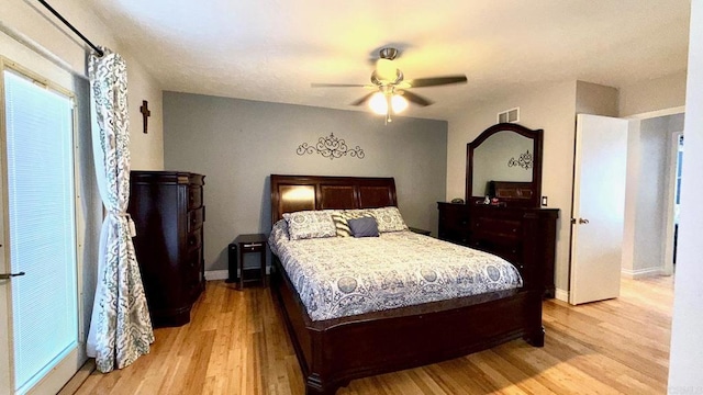 14330 Jennings Vista Way, Lakeside, CA 92040 - bedroom with light wood-style flooring and ceiling fan