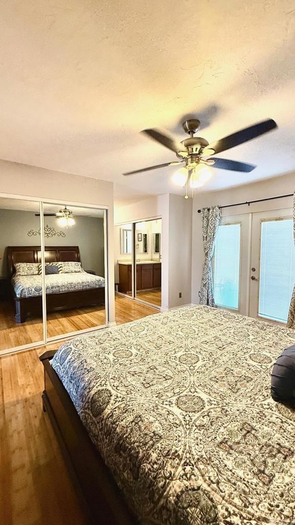 14330 Jennings Vista Way, Lakeside, CA 92040 - bedroom featuring wood finished floors, ceiling fan, and french doors
