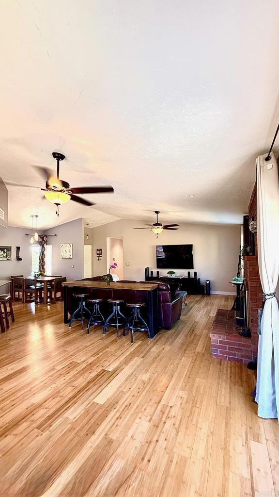14330 Jennings Vista Way, Lakeside, CA 92040 - living room featuring ceiling fan and light wood-type flooring