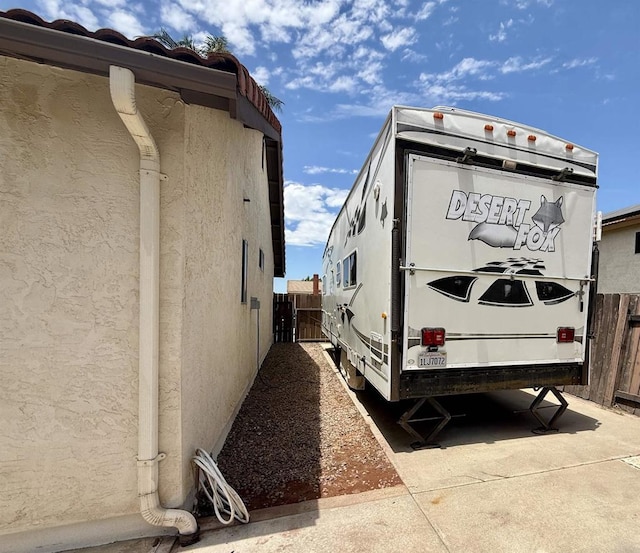 14330 Jennings Vista Way, Lakeside, CA 92040 - view of side of property with stucco siding and a gate