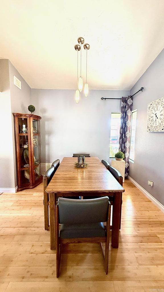 14330 Jennings Vista Way, Lakeside, CA 92040 - dining room featuring light wood-type flooring and baseboards