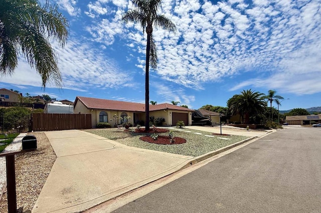 14330 Jennings Vista Way, Lakeside, CA 92040 - single story home with concrete driveway, an attached garage, and stucco siding