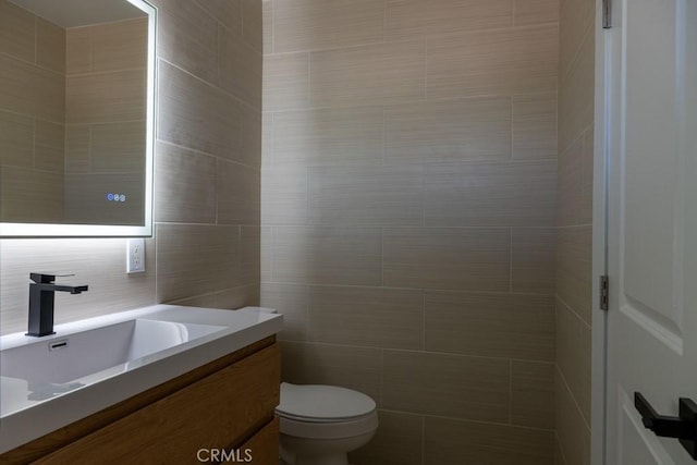 8666 Calaveras Ave, Rancho Cucamonga, CA 91730 - bathroom with vanity and tile walls