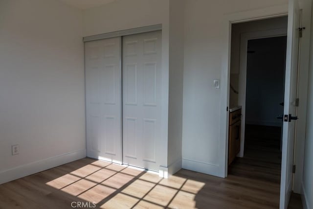 8666 Calaveras Ave, Rancho Cucamonga, CA 91730 - unfurnished bedroom featuring light wood-style floors and a closet
