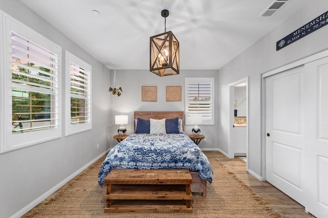 2990Eldenberry St, Escondido, CA 92029 - bedroom with light wood-type flooring and a closet