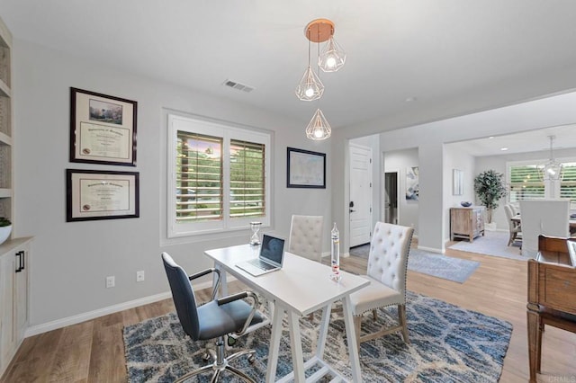 2990Eldenberry St, Escondido, CA 92029 - dining space with light wood-style flooring and an office area