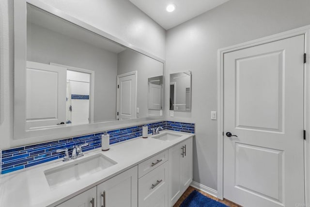2990Eldenberry St, Escondido, CA 92029 - bathroom featuring double vanity and decorative backsplash