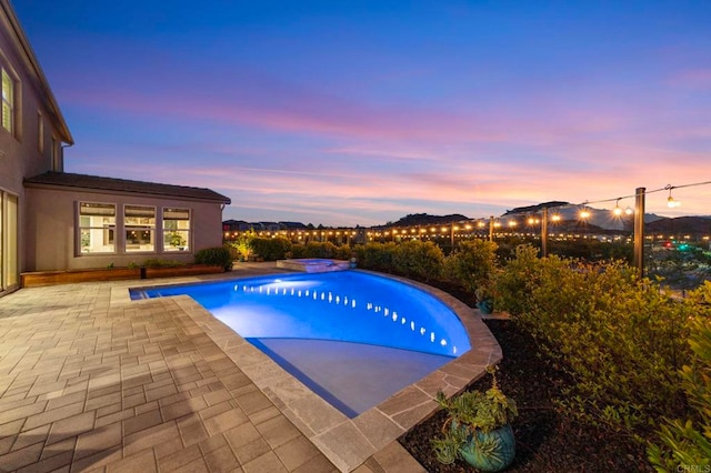 2990Eldenberry St, Escondido, CA 92029 - pool at dusk with a pool with connected hot tub and a patio area