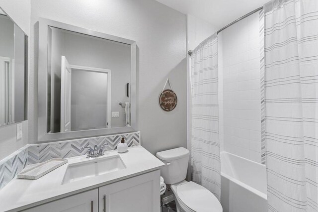 2990Eldenberry St, Escondido, CA 92029 - full bathroom with vanity, shower / tub combo with curtain, and backsplash