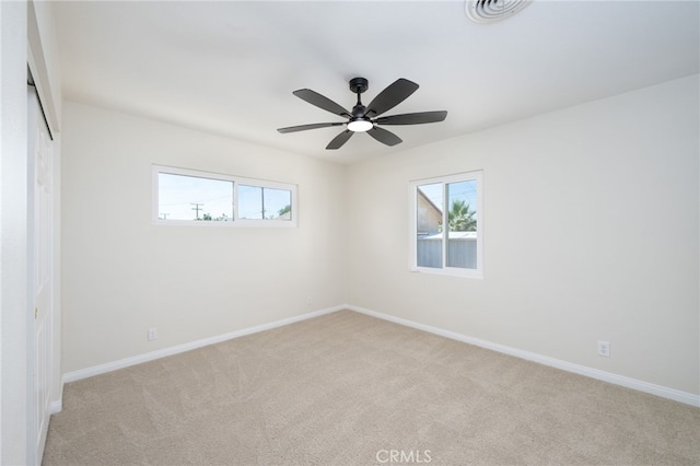 880 E Wright St, Hemet, CA 92543 - unfurnished bedroom with light carpet and ceiling fan