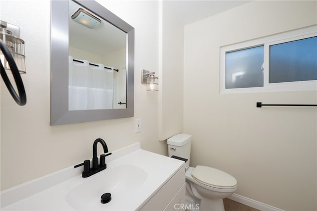 880 E Wright St, Hemet, CA 92543 - bathroom featuring toilet and vanity