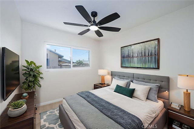 880 E Wright St, Hemet, CA 92543 - bedroom with a ceiling fan and wood finished floors
