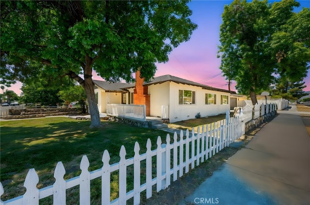 880 E Wright St, Hemet, CA 92543 - ranch-style house featuring a fenced front yard, stucco siding, and a chimney