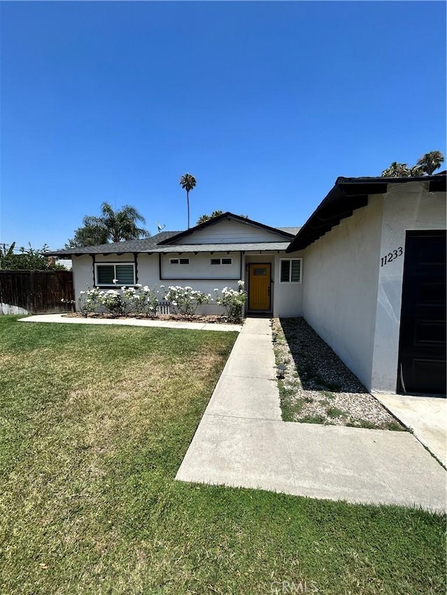 11233 Doverwood Dr, Riverside, CA 92505 - view of front facade featuring stucco siding