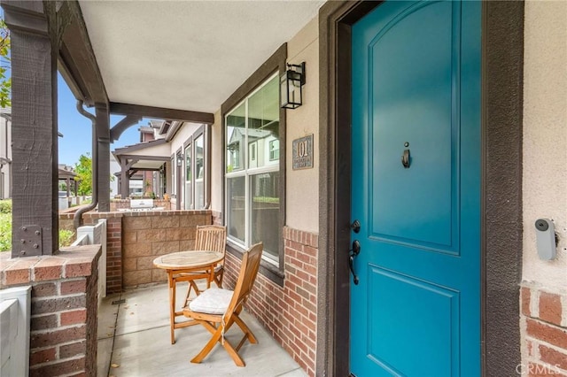 101 Red Brick Dr Unit 5, Simi Valley, CA 93065 - property entrance with covered porch and brick siding